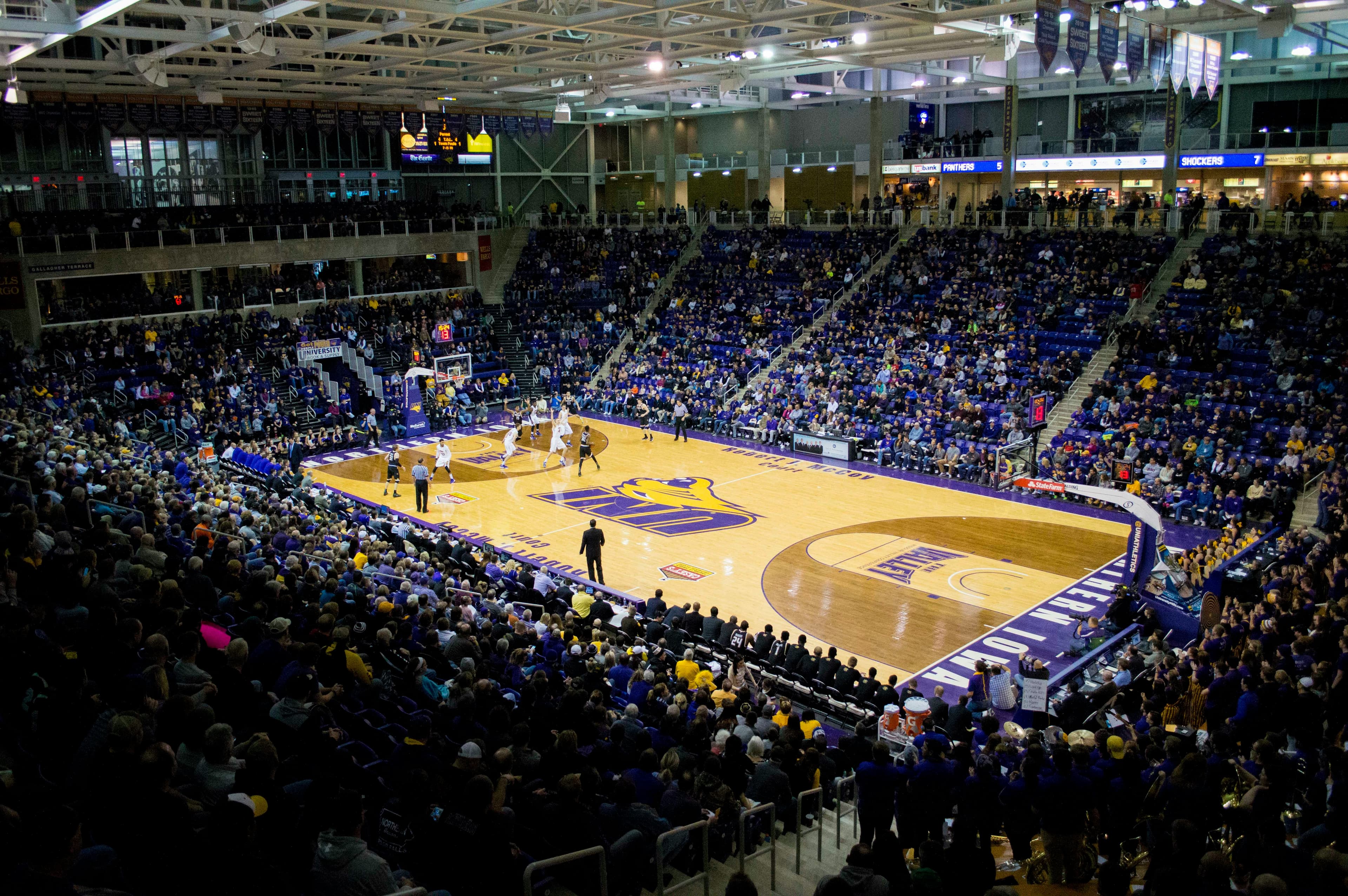 NCAA Basketball NCAA Division 1 basketball arena packed with fans during a college basketball game