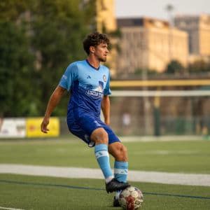 A soccer student-athlete in a blue jersey.