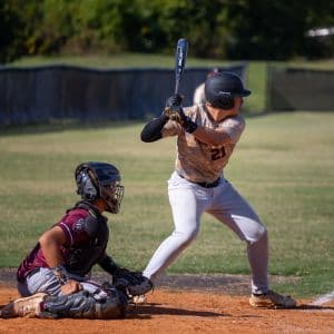 A baseball student-athlete awaiting a pitch.