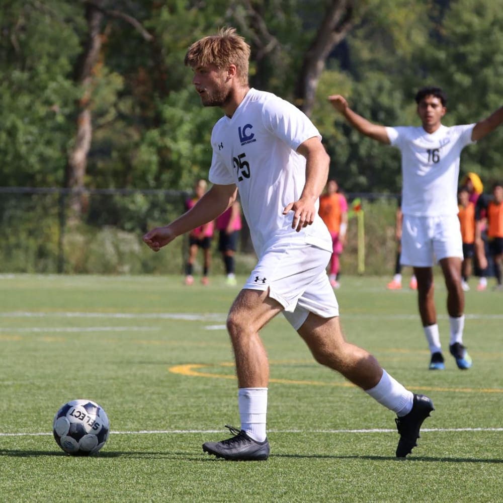 Raitis Bomis – Lewis & Clark Community College, NJCAA DI A soccer student-athlete looking for a pass during a soccer game.