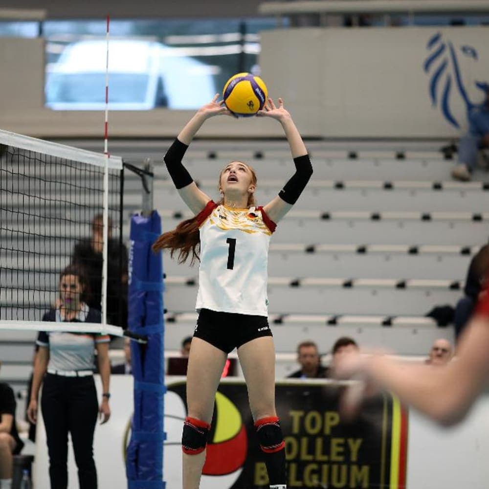 Sofia Varela – Long Island University, NCAA DI Female volleyball player Sofia Varela setting the ball for her teammates.