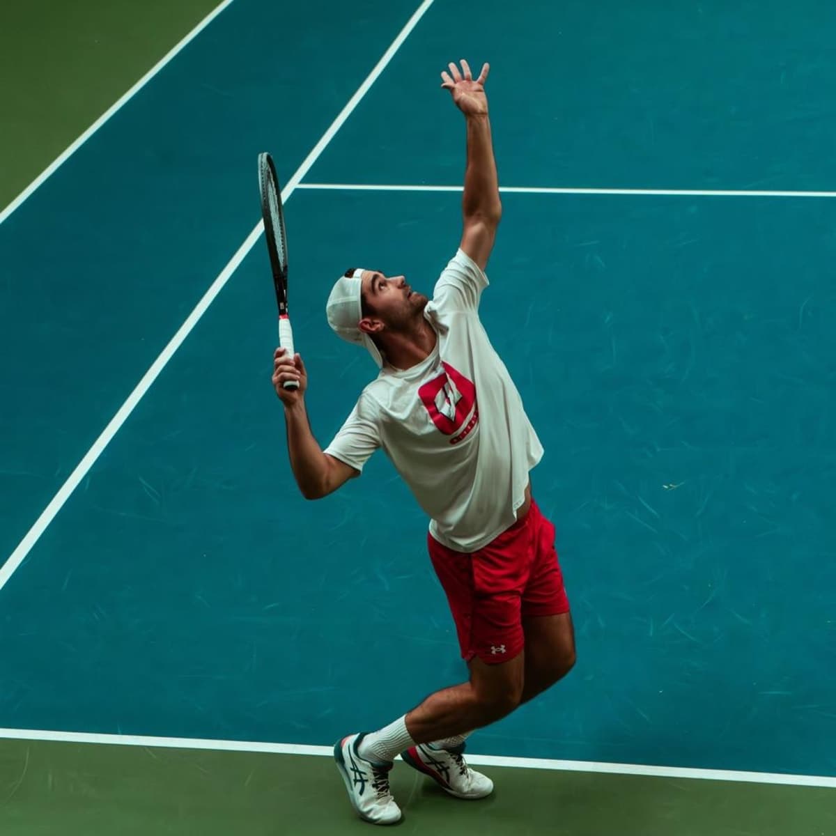 Interview with Gabriel Huber Gabriel Huber playing college tennis at the University of Wisconsin-Madison