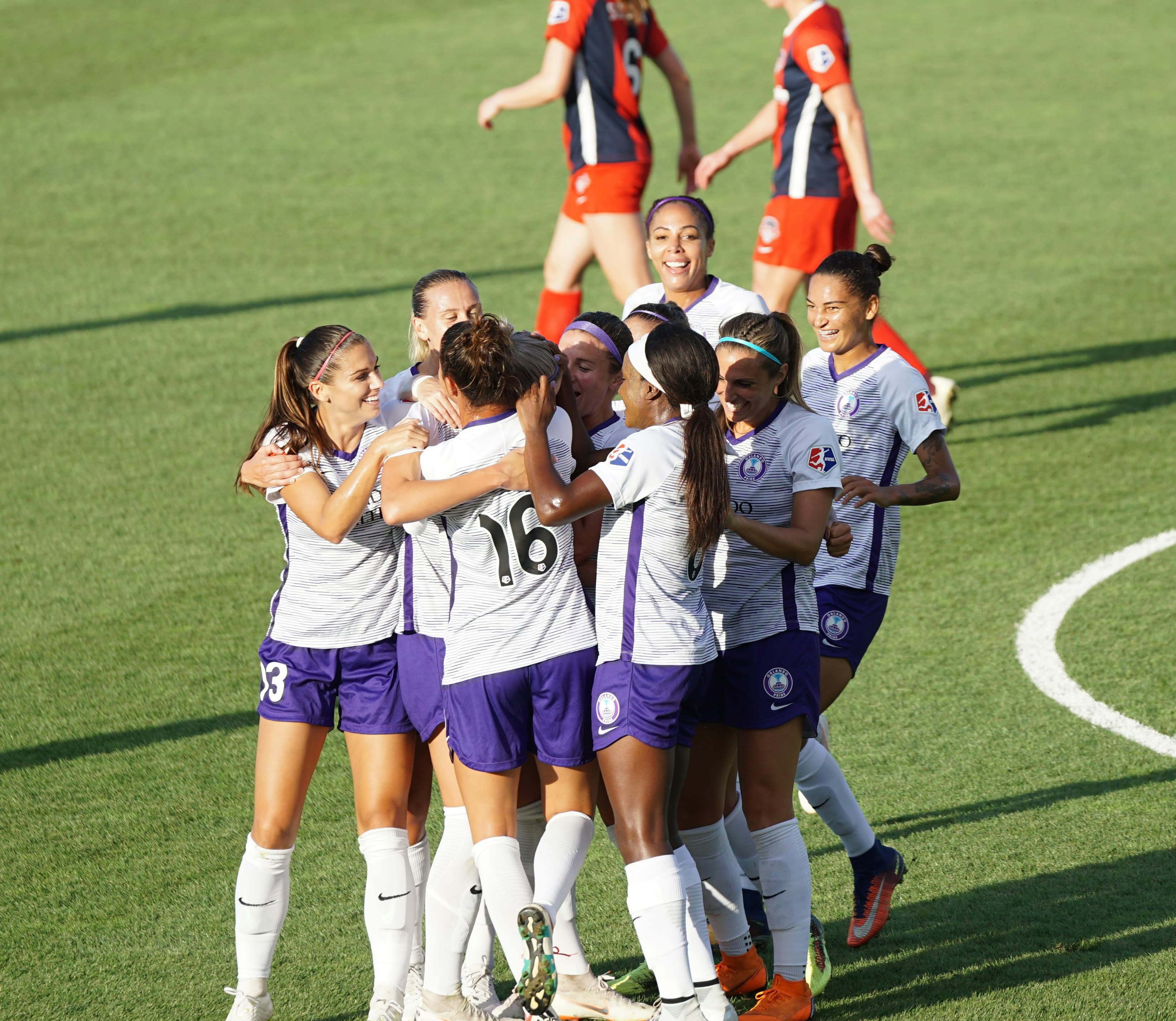 Eligibility and Visa Requirements for College Female college soccer team celebrating together with unity and team spirit