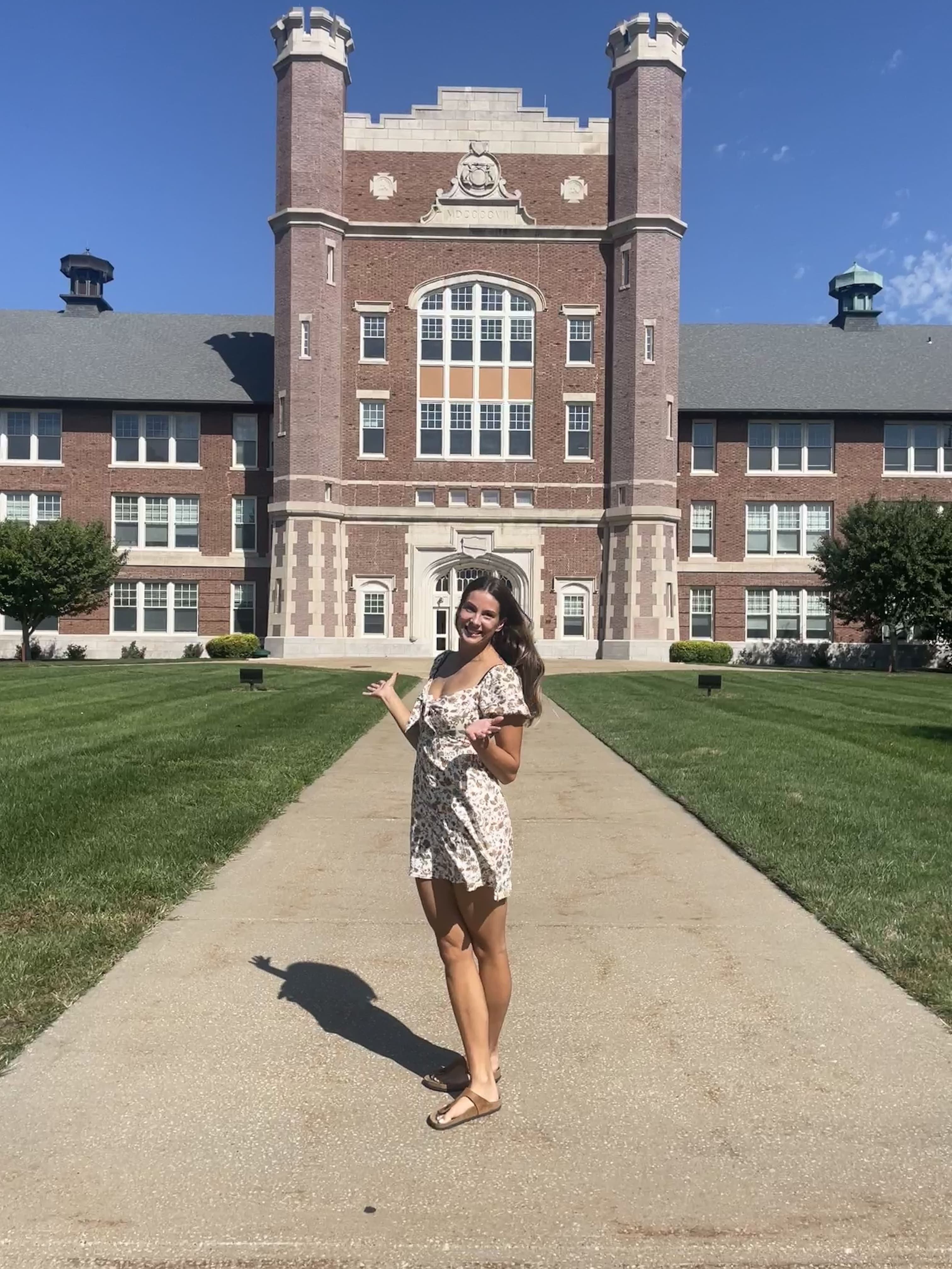 Maja Nöhrer at Northwest Missouri State University Campus College volleyball player Maja Nöhrer smiling in front of an academic building at Northwest Missouri State University.